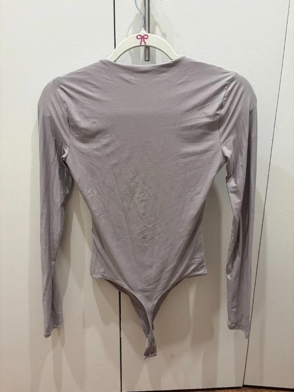 Abercrombie long-sleeved body suit. Light mauve, size XS